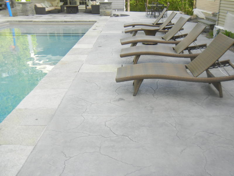 Swimming pool and stamped concrete project example 40